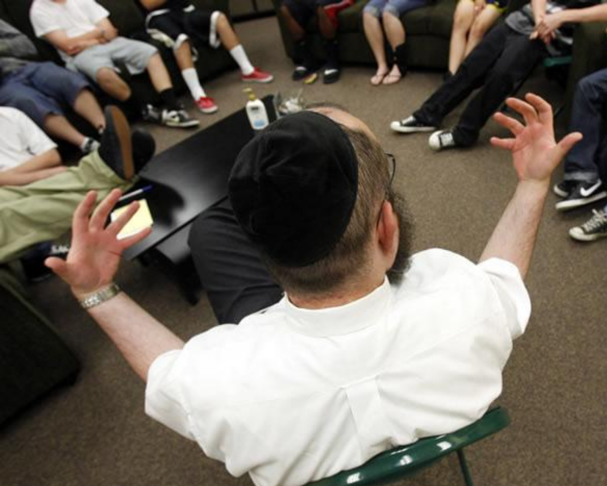 Image of a Rabbi offering Group Therapy s part of Kosher Recovery